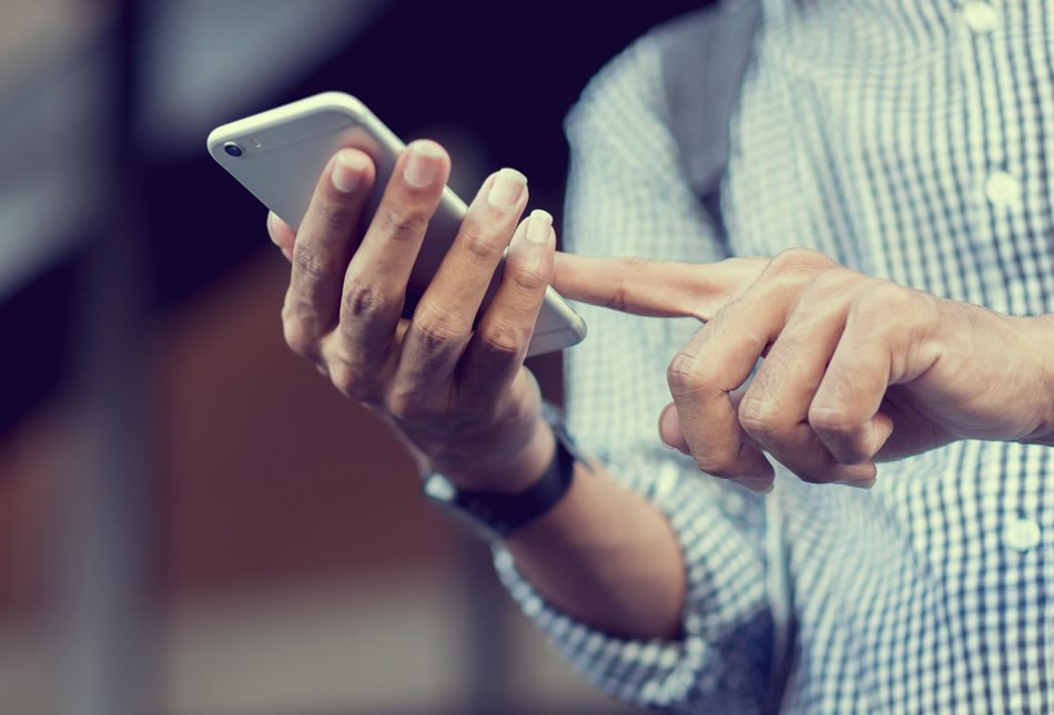 Innovate Person swiping mobile phone