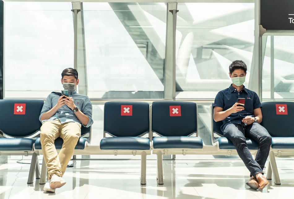 Airport terminal seating restrictions for physical distancing of passengers during pandemic control measures.